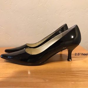 Fancy black dress shoe with heel